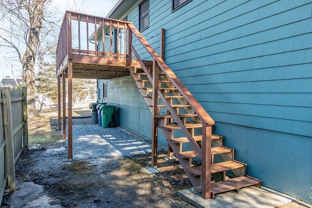 exterior space with fence and a wooden deck