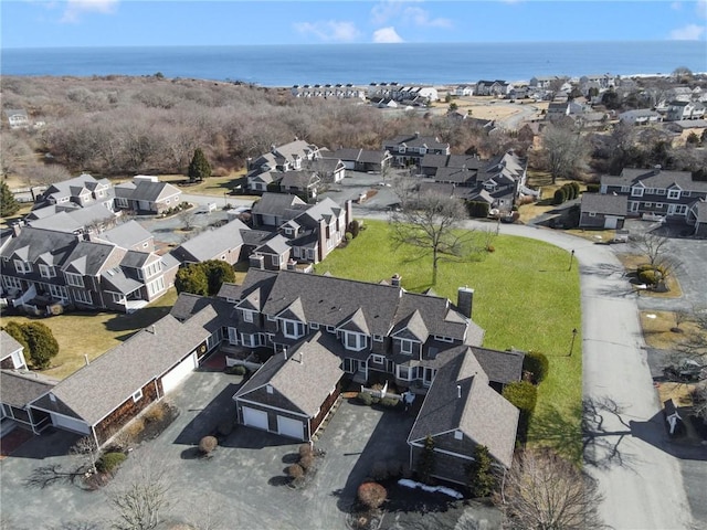 aerial view with a water view and a residential view