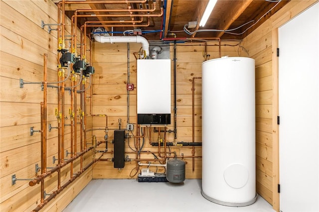 utility room featuring water heater