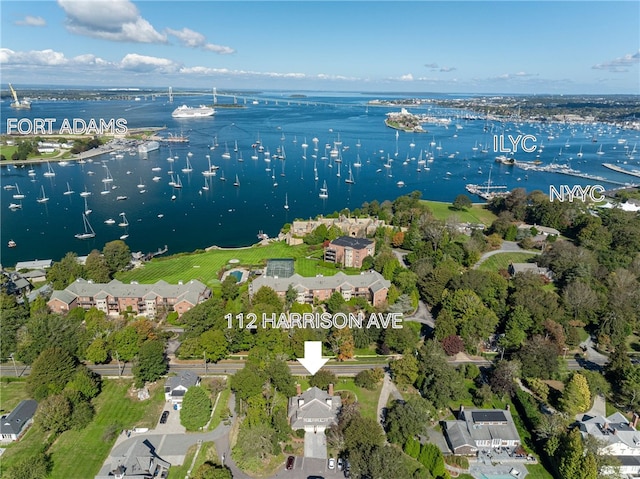 birds eye view of property featuring a water view