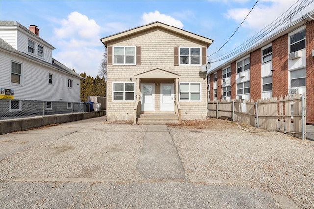 view of front of property with fence