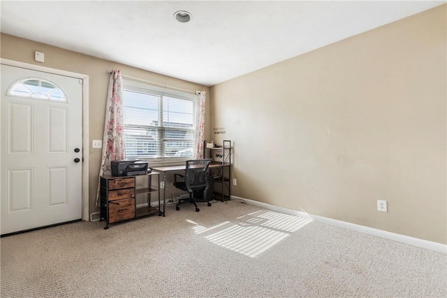 office space featuring carpet floors and baseboards