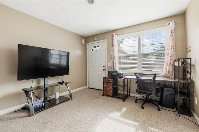 home office featuring carpet and baseboards