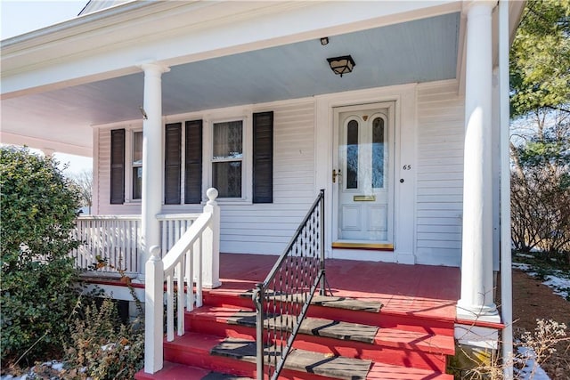 doorway to property featuring a porch