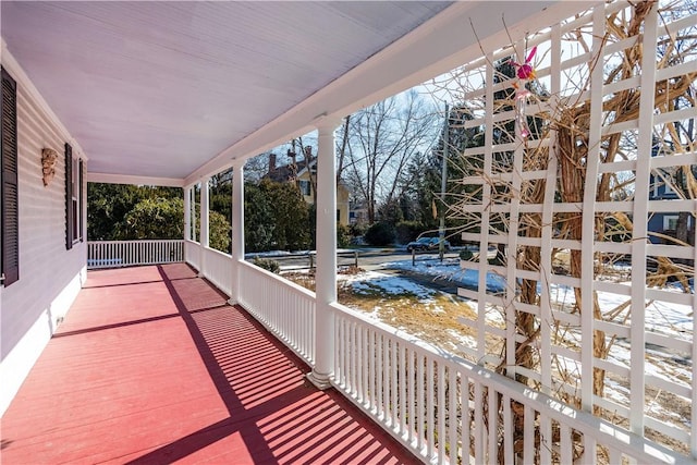 wooden terrace with covered porch