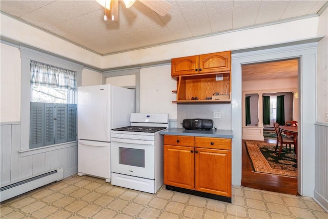 kitchen with a baseboard heating unit, white appliances, light floors, and open shelves