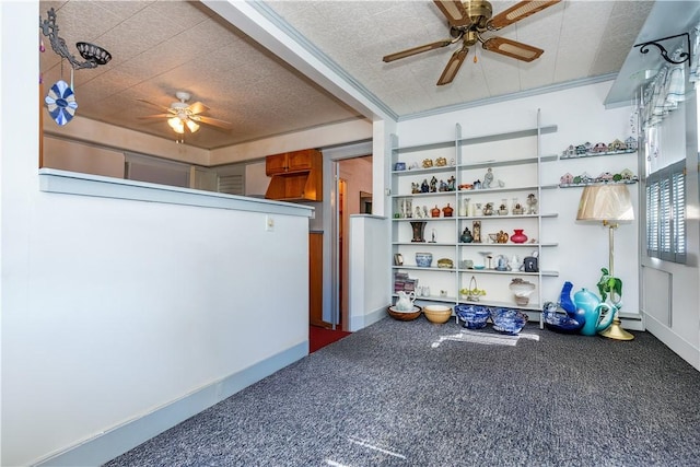 interior space with a baseboard heating unit and a ceiling fan