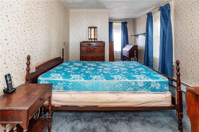 carpeted bedroom featuring a baseboard heating unit and wallpapered walls