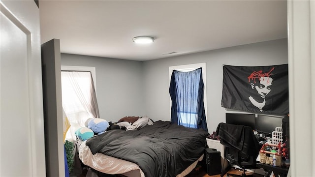 bedroom with visible vents