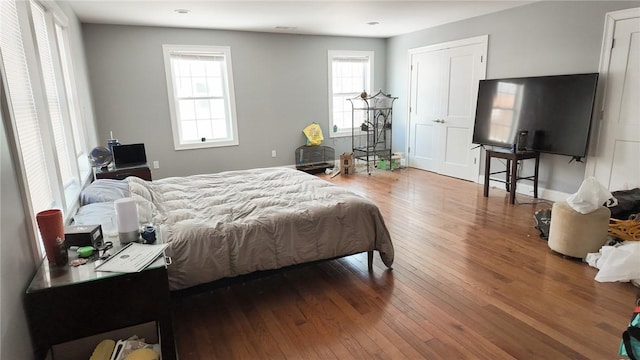 bedroom featuring hardwood / wood-style floors