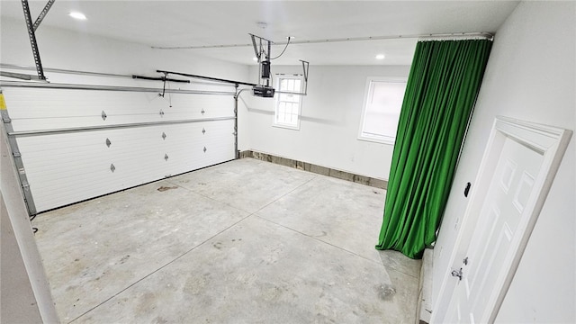 51 Spring St, Pawtucket, RI 02860 - garage with a garage door opener and recessed lighting