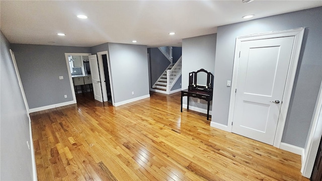 51 Spring St, Pawtucket, RI 02860 - spare room with light wood-style floors, stairs, and recessed lighting