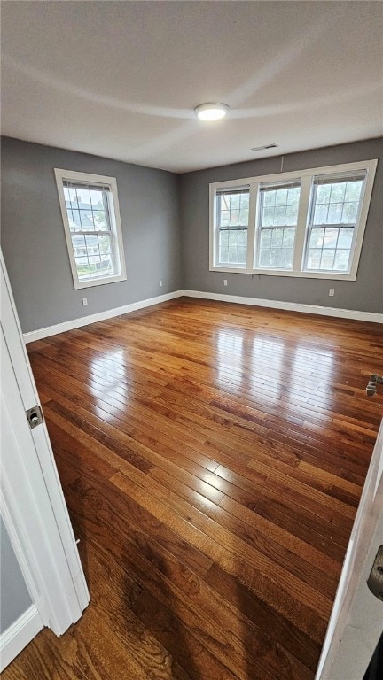 51 Spring St, Pawtucket, RI 02860 - unfurnished room with healthy amount of natural light and wood finished floors
