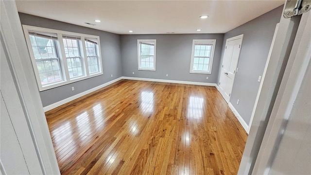 51 Spring St, Pawtucket, RI 02860 - empty room featuring light wood-style floors and recessed lighting