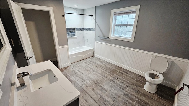 51 Spring St, Pawtucket, RI 02860 - full bath featuring wood finished floors, wainscoting, bathtub / shower combination, vanity, and recessed lighting