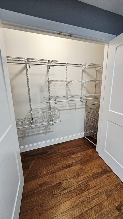 51 Spring St, Pawtucket, RI 02860 - walk in closet with dark wood finished floors