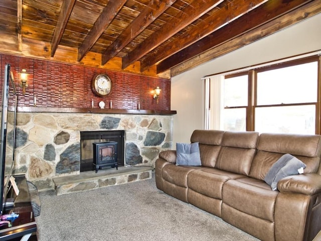 living room with carpet flooring, wooden ceiling, beam ceiling, and a wood stove