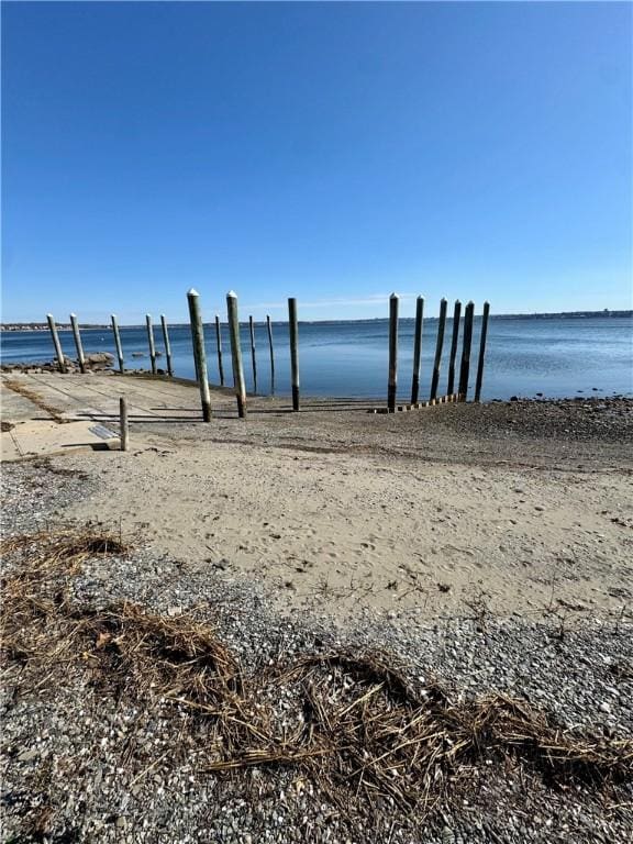 view of dock with a water view