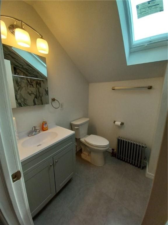 full bathroom with lofted ceiling, radiator heating unit, toilet, and vanity