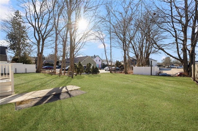 view of yard featuring fence