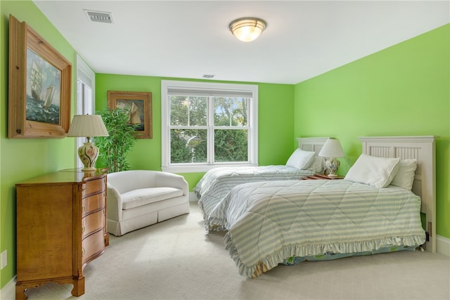 bedroom with carpet and visible vents