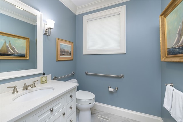 bathroom with visible vents, toilet, ornamental molding, vanity, and baseboards