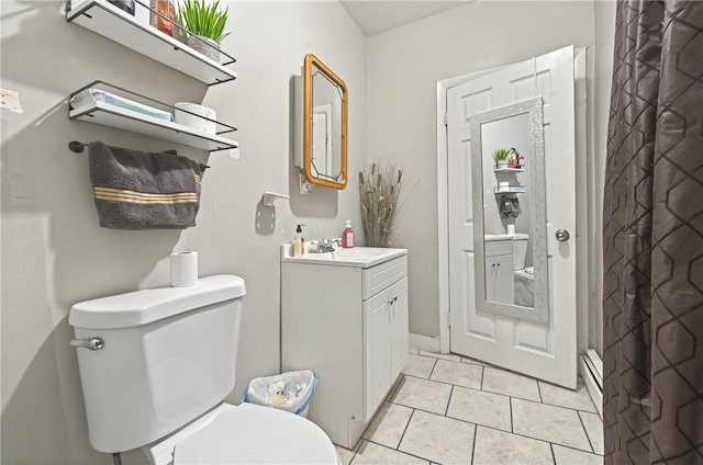 full bath with toilet, a shower with curtain, vanity, and tile patterned floors