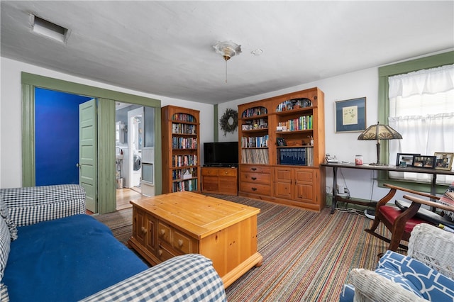 living area with carpet flooring