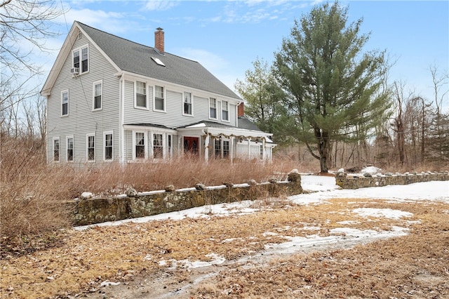 view of front of house with a chimney