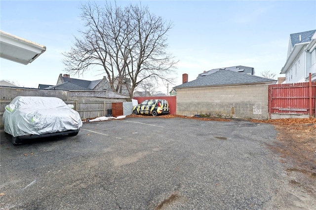 107 Lenox Ave, Providence, RI 02907 - uncovered parking lot featuring fence
