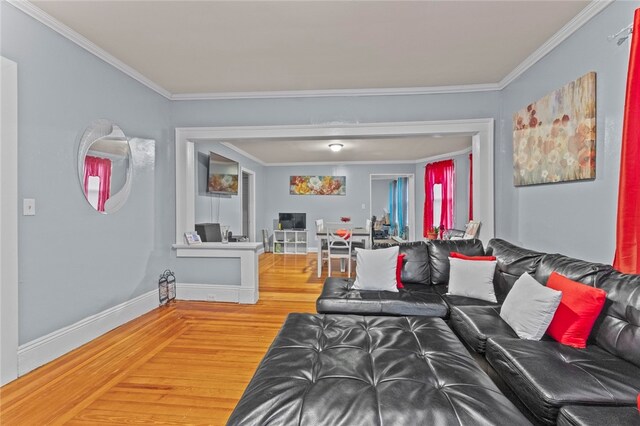 107 Lenox Ave, Providence, RI 02907 - living area with crown molding, baseboards, and wood finished floors