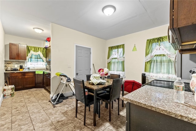 107 Lenox Ave, Providence, RI 02907 - dining area featuring light tile patterned flooring
