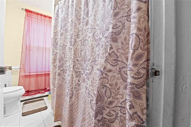 107 Lenox Ave, Providence, RI 02907 - bathroom with a shower with curtain, a baseboard radiator, toilet, and tile patterned floors