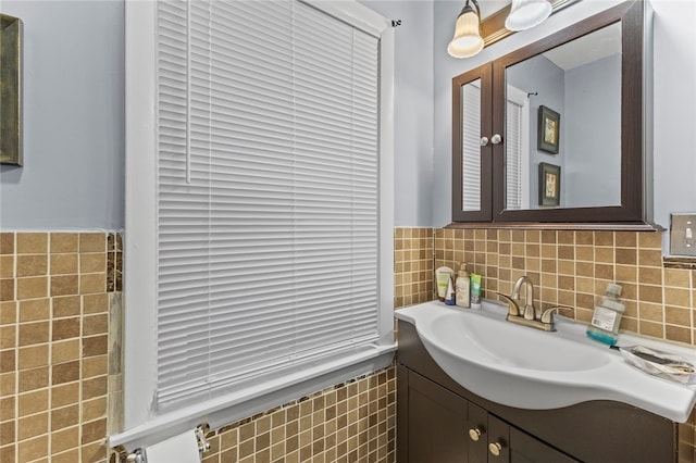 107 Lenox Ave, Providence, RI 02907 - bathroom with wainscoting, tile walls, and vanity