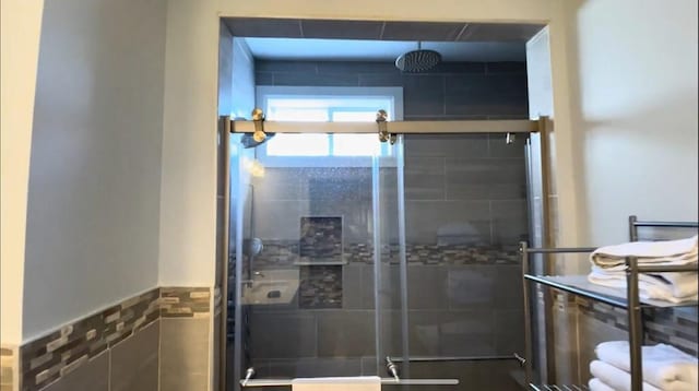 full bathroom with a stall shower