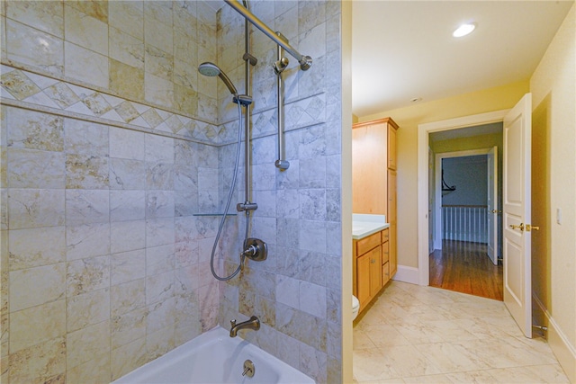 full bathroom with recessed lighting, bathtub / shower combination, baseboards, and vanity