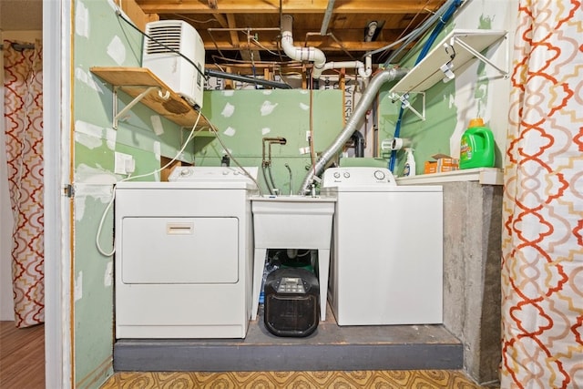 laundry area featuring laundry area and washer and clothes dryer