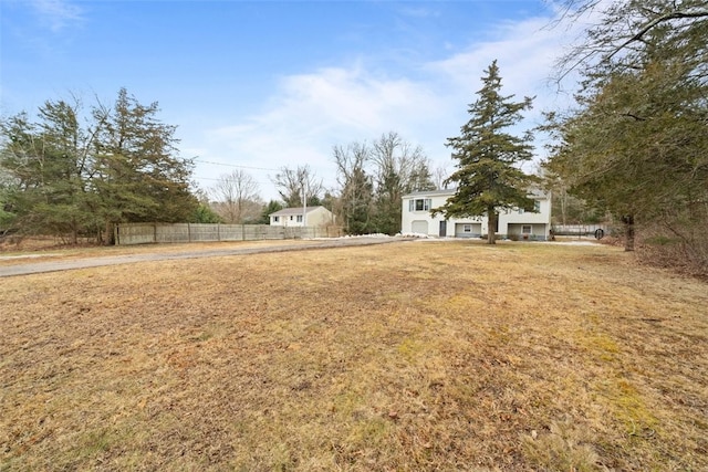 view of yard with fence