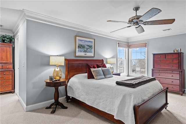 carpeted bedroom with ceiling fan, ornamental molding, visible vents, and baseboards