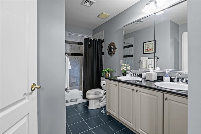 full bath featuring a sink, visible vents, and tile patterned floors