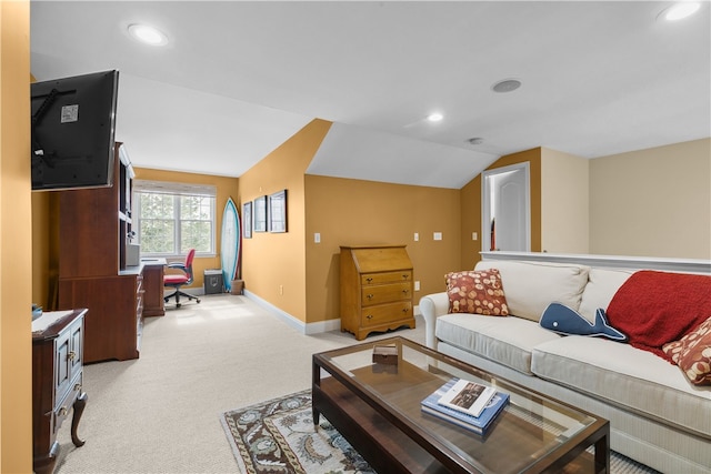 living area with recessed lighting, baseboards, vaulted ceiling, and light colored carpet