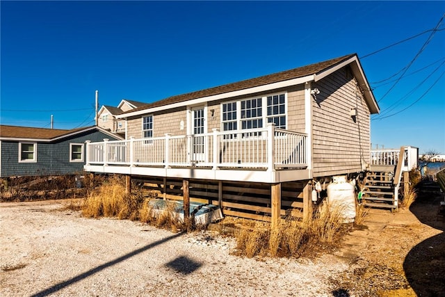 view of front of house featuring a deck