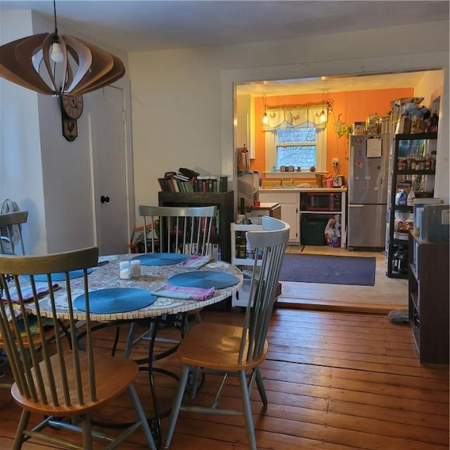 dining area featuring hardwood / wood-style floors