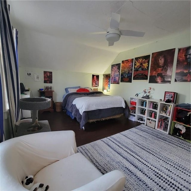 bedroom with vaulted ceiling and a ceiling fan