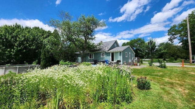 exterior space featuring a lawn