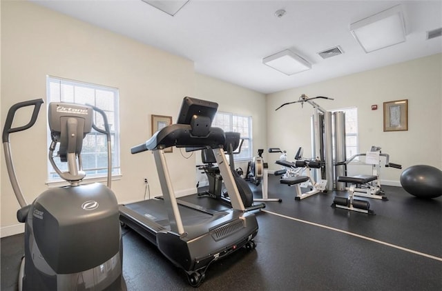 workout area featuring visible vents and baseboards