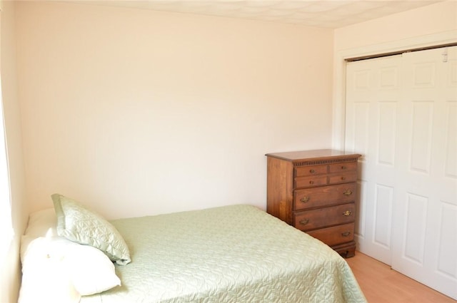 bedroom with light wood-type flooring