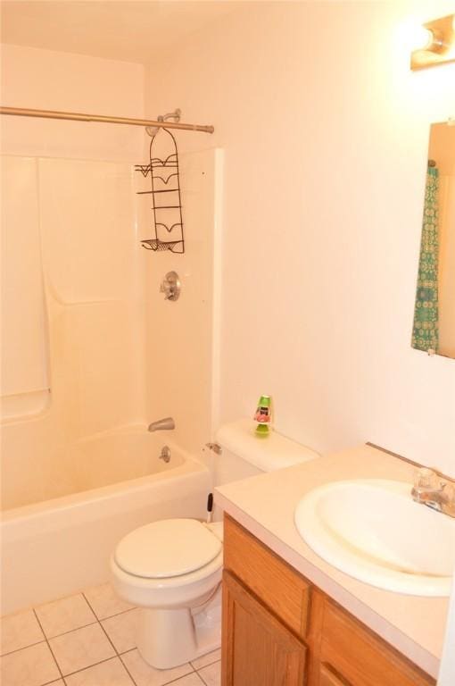 full bath with toilet, shower / tub combination, vanity, and tile patterned floors