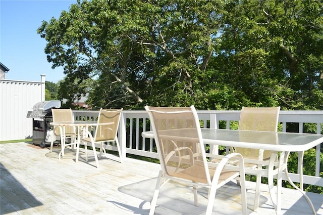 wooden deck with grilling area