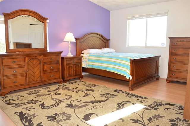 bedroom featuring light wood-style flooring